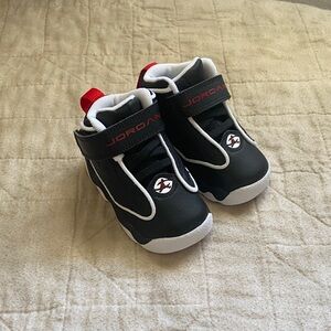 Jordan Baby Black and White Sneakers with Red Accents
